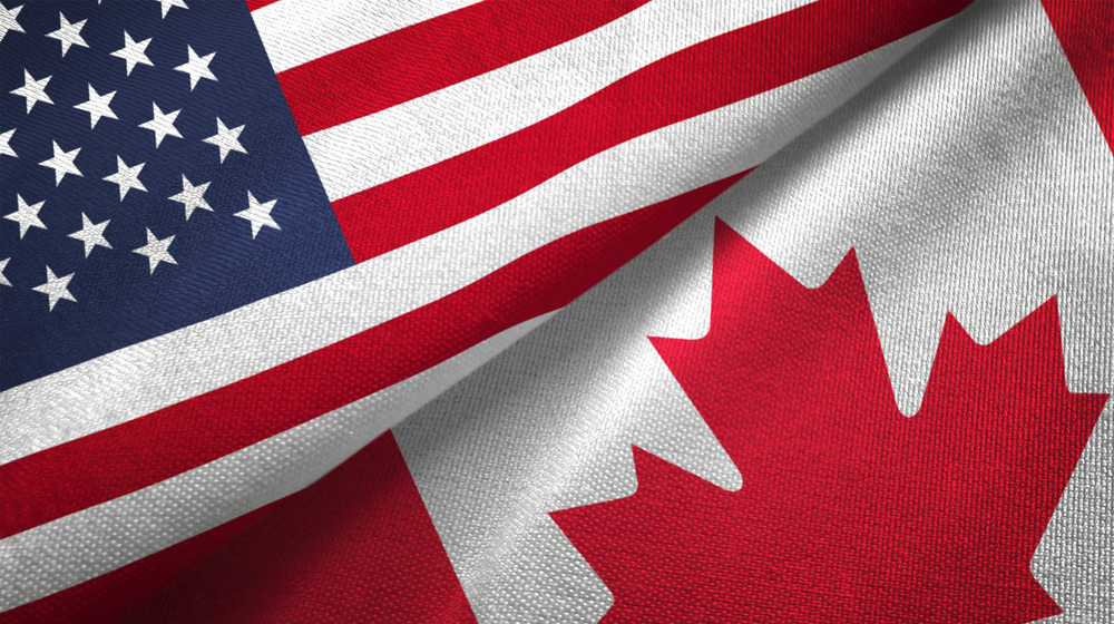 Canada and United States two flags together