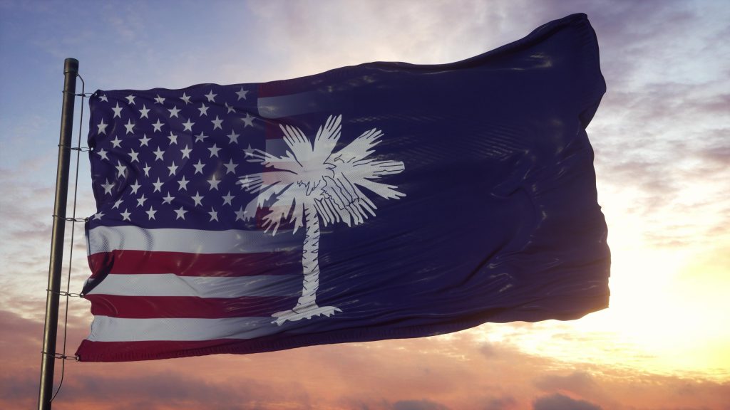 South Carolina and USA flag on flagpole