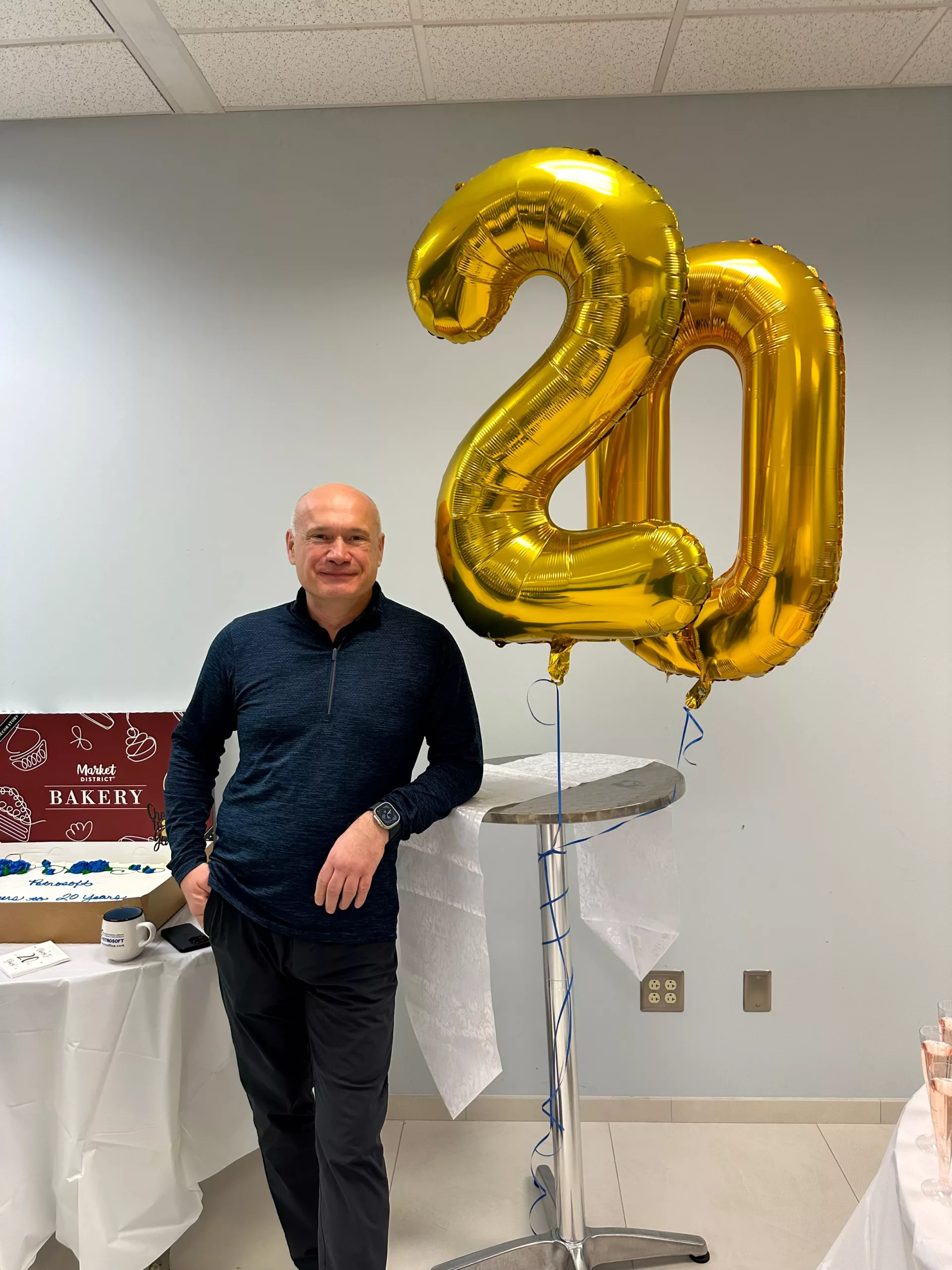 Petrosoft CEO Sergei Gorloff celebrates the company's 20th anniversary